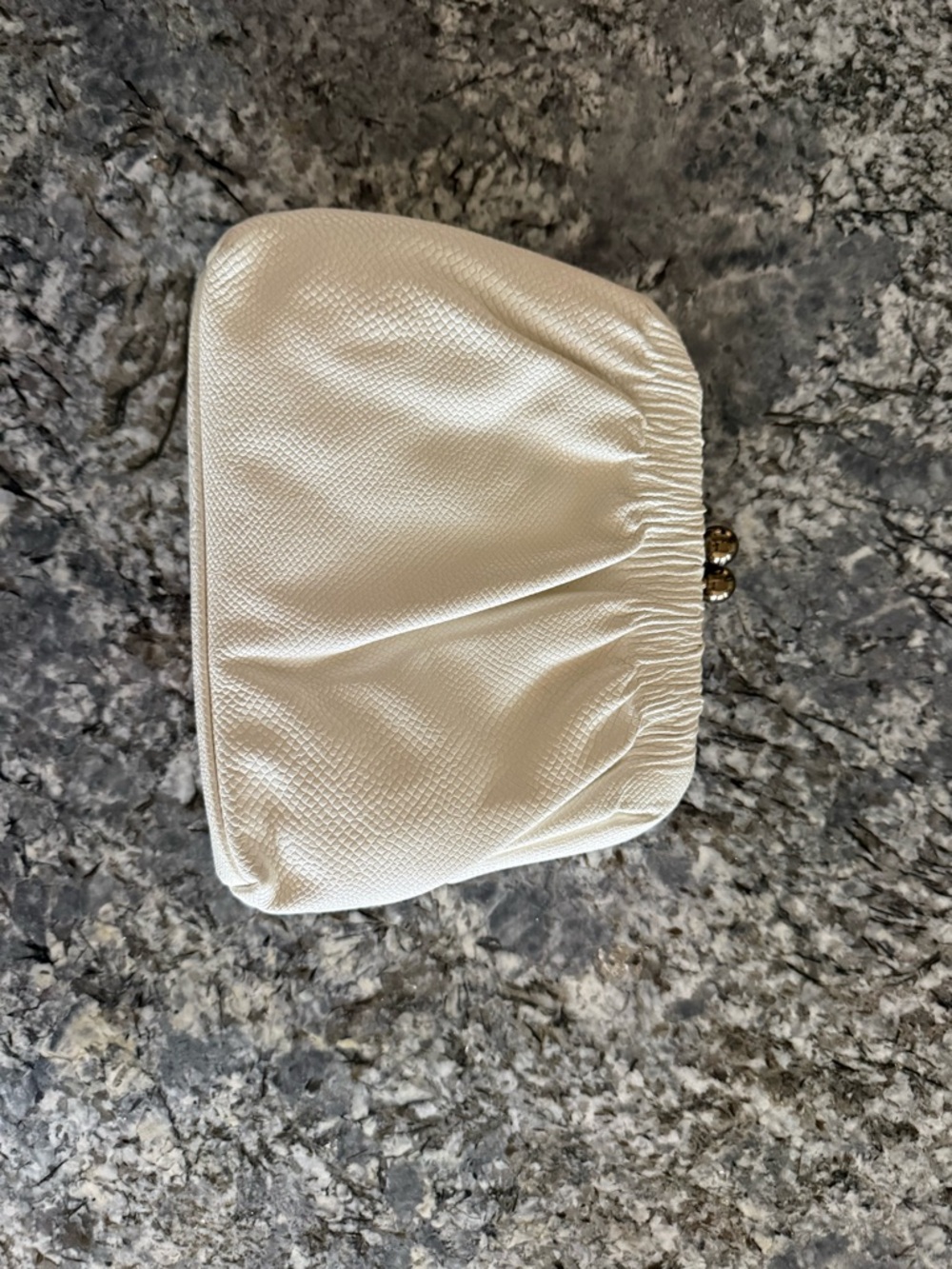 Cream Textured Frame Clutch Purse
Leather 1950 vintage